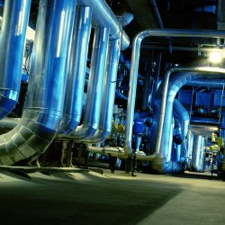 Pipes, tubes, machinery and steam turbine at a power plant